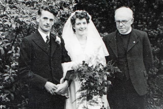 Henry Holmes and his wife Carmen on their wedding day on June 21, 1952.