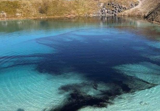 Police have dyed the water of the so-called Blue Lagoon in Buxton.