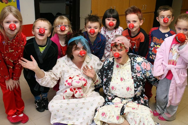 Children and staff wear their pyjamas at Ripley Infant School in 2009.