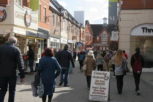 Shoppers pictured as they returned to Chesterfield town centre on Monday