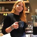 Cafe owner Rowan Adlington raises a cup to her staff and guests who have made Figaro a vibrant and welcoming space.