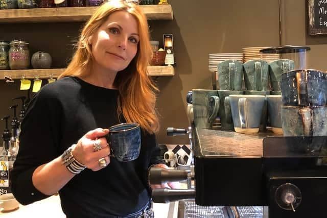 Cafe owner Rowan Adlington raises a cup to her staff and guests who have made Figaro a vibrant and welcoming space.