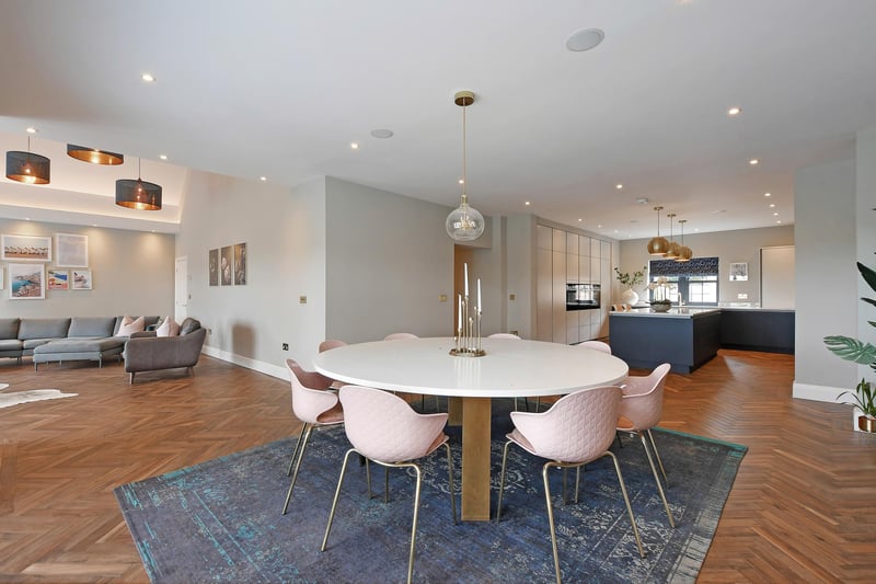 A stunning extensive living kitchen which opens out to the rear garden and is ideal for family living and entertaining