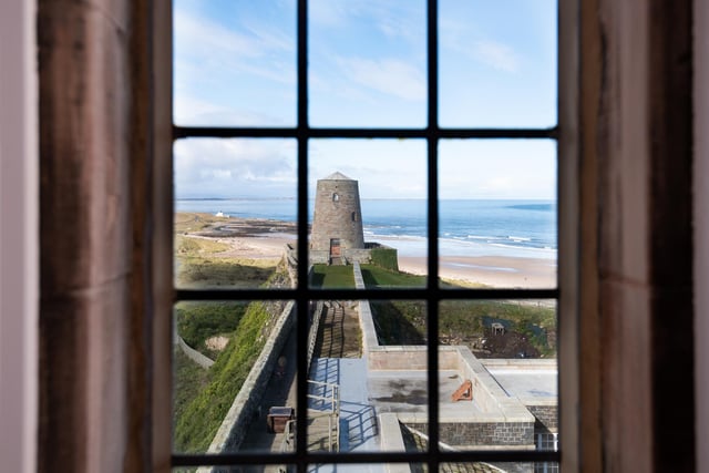 Looking out towards Bamburgh beach and the Farne Islands through one of the mullioned windows.

Picture: T Bloxham Inside Story Photography