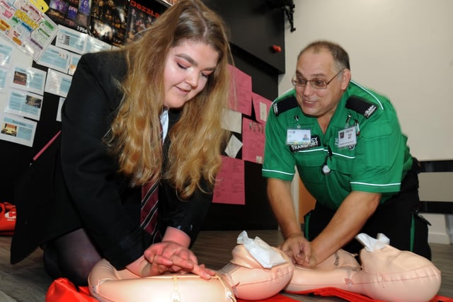 Eliza Whitley is given heart start training from St. John's Ambulance emergency medical technician Gavin Smith, during his visit to the Brookfield Community School in Chesterfield in 2017
