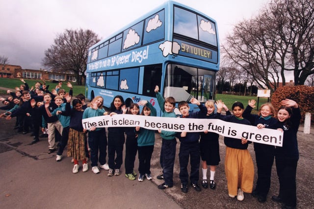 Totley pupils alongside the BP/first group greener diesel bus in 2000