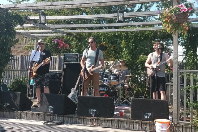 Blacktop Sliders play to the crowd at Shinefest
