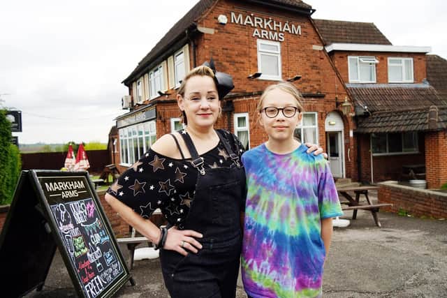 Rebecca and her son George outside the Markham Arms.