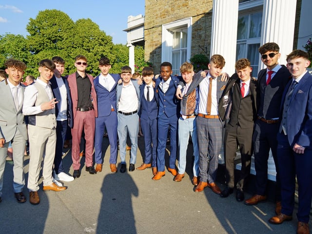 Boys are suited and booted for the prom night party.