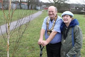 Mayor of Amber Valley, Councillor David Taylor, plants a tree, accompanied by his wife, Mayoress Valerie Taylor