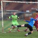 Action from the Junior Cup clash between Boot and Shoe (Blue) and Swadlincote Spartans. Photos by Martin Roberts.