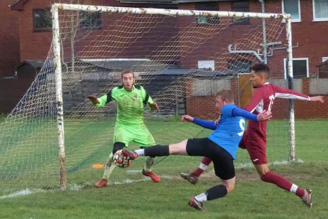 Action from the Junior Cup clash between Boot and Shoe (Blue) and Swadlincote Spartans. Photos by Martin Roberts.