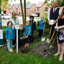 Beavers and cubs from the Second Brampton Scout group were invited, by Walton Peaks housing development, to fill and bury a time capsule. In the picture Cubs, Beavers, Bik Hughes-Jones asst beaver leader, David Tinlsy sales consultant Linden Homes and Jess Sidwell marketing manager Linden Homes.