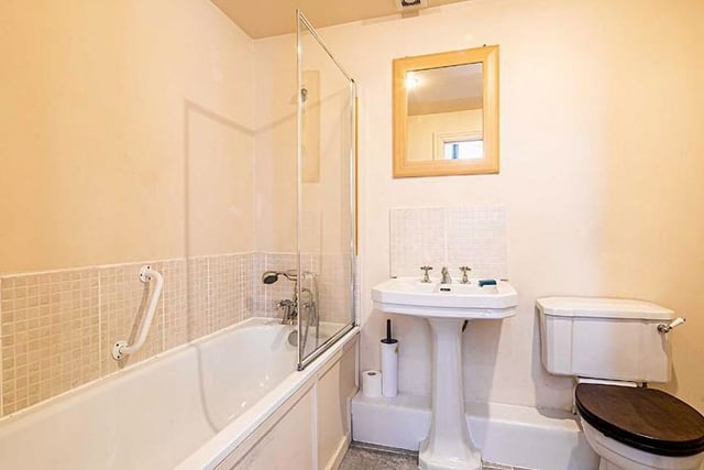 The apartment has a further bathroom with a shower, WC and sink.