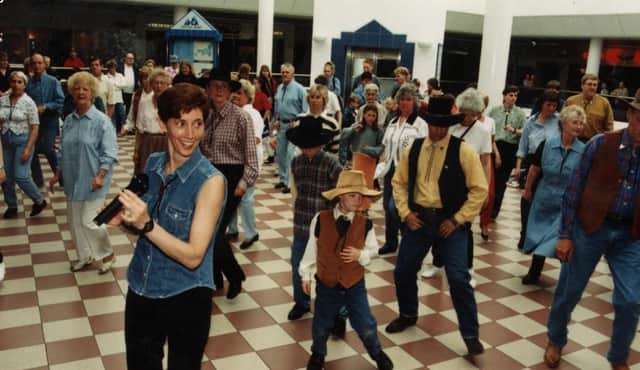 Line dancers showing off their moves in 1997