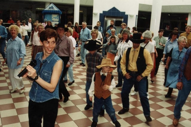 Line dancers showing off their moves in 1997