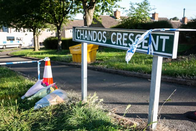 Flowers have been left in Killamarsh where four people were found dead at a house at the weekend.