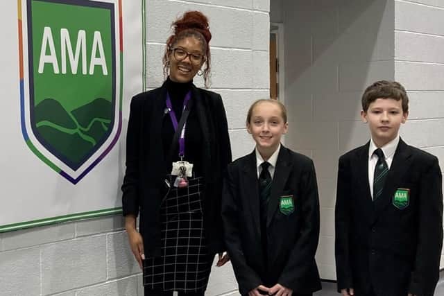 Year seven head Olivia Thomas with Ruby Stanbrook and Benjamin Rendall