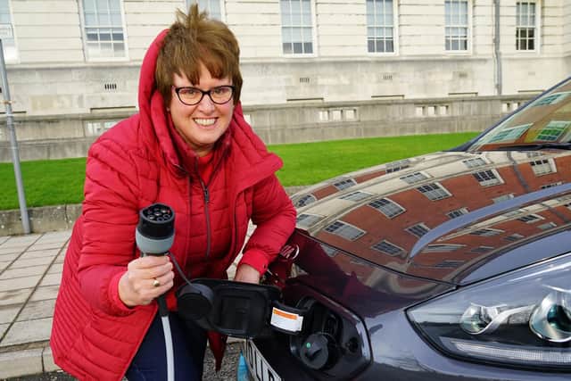 Councillor Tricia Gilby, leader of Chesterfield Borough Council, with her electric car.