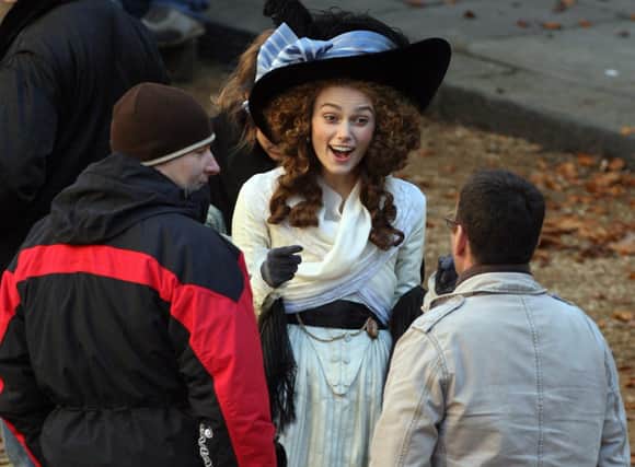 Kedleston Hall has etched its name in filmography with appearances in The Duchess. Pictured is Keira Knightley sharing a joke with film crew.