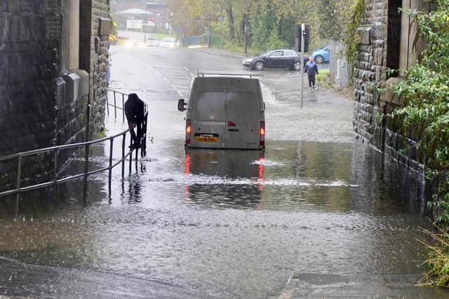 Extensive flooding has left Derbsyhire residents evacuated and businesses shut, as an elderly woman was killed by flood in her own home.