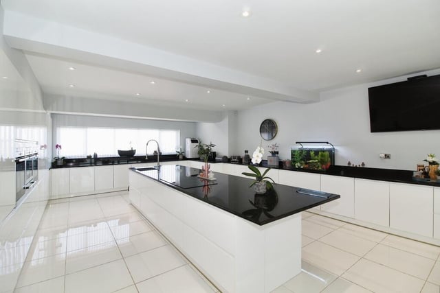 Here is our first look at the wonderful, fitted kitchen at the £1.1 million property. With units surrounding a large breakfast island, it is amazingly spacious.