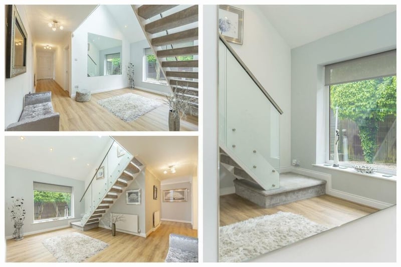 It's time to go upstairs now, via the attractive hallway and the lovely, carpeted staircase with glass balustrade.