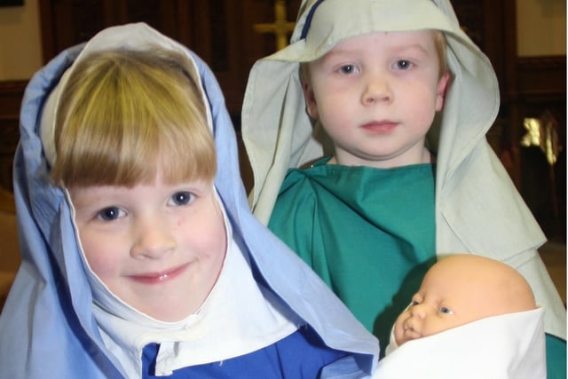 Mia Cooper (Mary) and Oliver Hinchley (Joseph) played the lead roles in Abercrombie School's nativity play in the Holy Trinity Church, Chesterfield, in 2008.