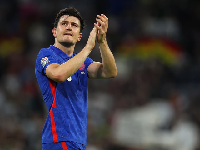 Harry Maguire, born March 5, 1993, went to St Mary's Catholic High School in Chesterfield and came through the youth system at Sheffield United before graduating to the first team. In 2019, he moved to Manchester United for a fee believed to be £80 million - a world-record amount for a defender, and within six months was appointed the club captain. Maguire also plays for the England national team. He is pictured applauding fans after the UEFA Nations League League A Group 3 match between Germany and England.


He currently plays for Manchester United and the England National team

 England applauds the fans after the UEFA Nations League League A Group 3 match between Germany and England at Allianz Arena on June 07, 2022 in Munich, Germany. The German national team will play the match in the Womenâ€™s national kit in support of their upcoming UEFA Womenâ€™s European Championship campaign. (Photo by Alex Grimm/Getty Images)