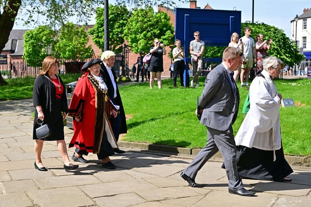 Councillor Jenny Flood - Chesterfield’s 383rd mayor - approaches the Crooked Spire