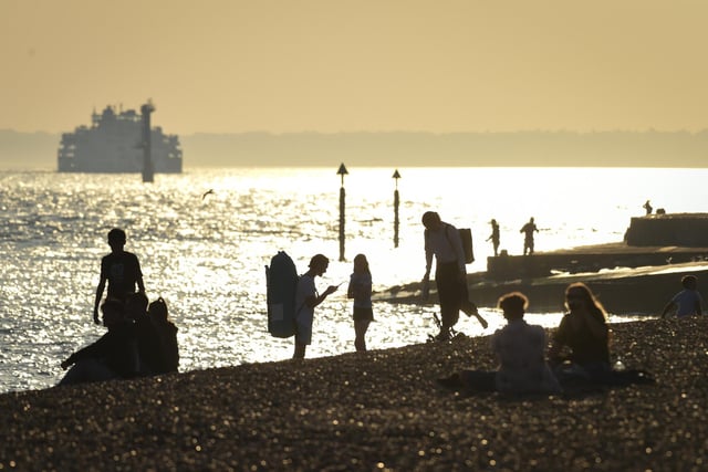 People enjoy the evening sunshine on Southsea beach on September 21, 2020 in Portsmouth. Picture: Finnbarr Webster