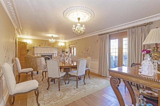 Picture yourself enjoying lunch or dinner with family and friends in this fabulous formal dining room.