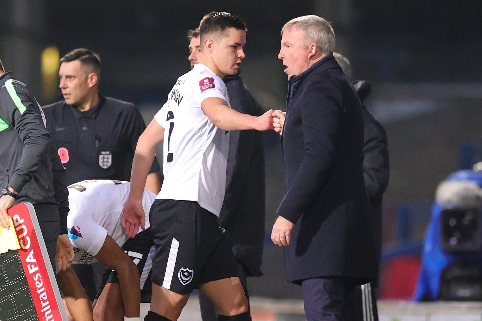 Pompey manager Kenny Jackett acknowledges Callum Johnson after he was substituted at Ipswich. Picture: Nigel Keene