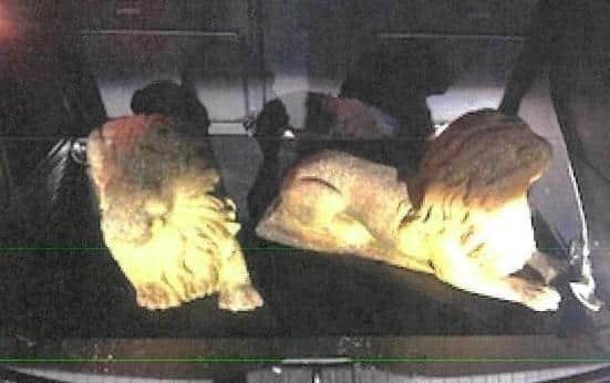 Officers are trying to identify the owners of two lion stone statues that were seized from a car in Cheshire.