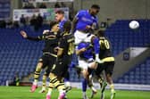 Chey Dunkley heads in for Chesterfield against Manchester City U21s. Pic by Tina Jenner