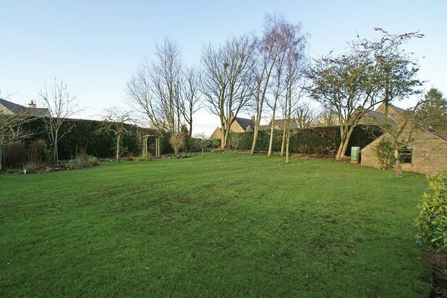 An area of the garden is laid to lawn.