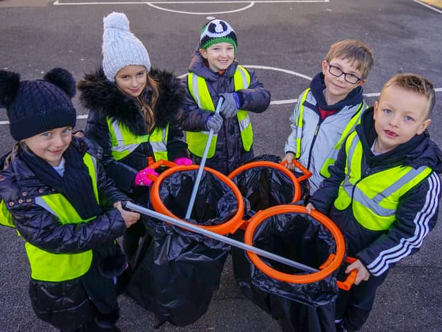 Brave Year 2 pupils from the Green Flying High Academy in South Normanton took part in a litter pick in freezing weather in a bid to help the Earth.