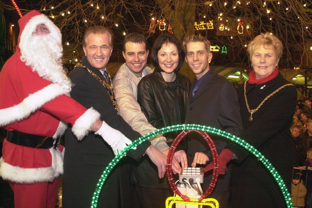 Santa arrived in Chesterfield market place to help ex-Hollyoaks star Lisa Williamson and former Coronation Street star Nick Cochrane, who were starring in Aladdin at the Pomegranate Theatre, switch on the Christmas lights in 2000.  Chesterfield mayor and mayoress Councillor Mick Leverton and Loretta Leverton and Peak FM presenter Craig Pattison joined in.