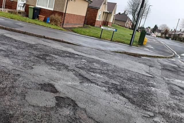 This severely damaged and potholed Chesterfield road in a ‘dire condition’ has been reported to highways chiefs. Image: Coun Anne-Frances Hayes.