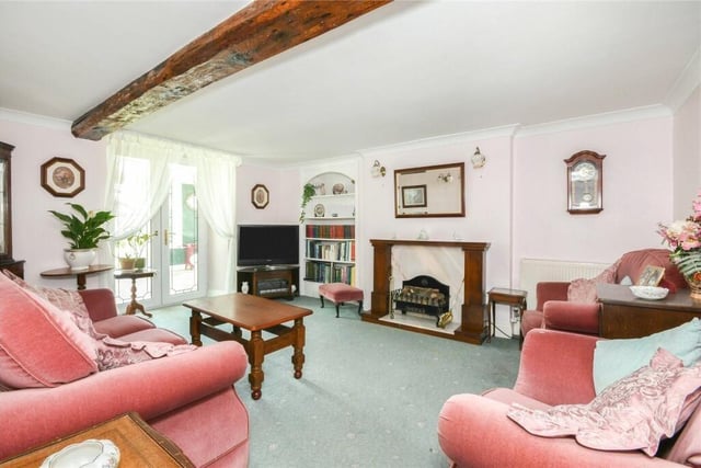 An exposed ceiling beam is in keeping with the traditional feel of this part of the property.