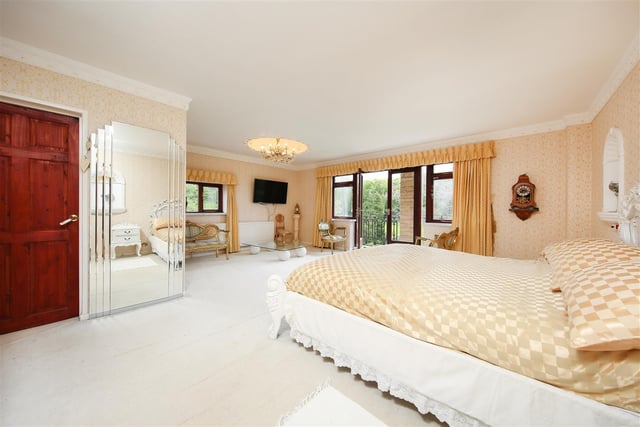 The master bedroom has a dressing room, ensuite and balcony.