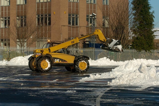 Chesterfield FCs b2net stadium in the snow. A digger was brought in to clear the car park in December 2010