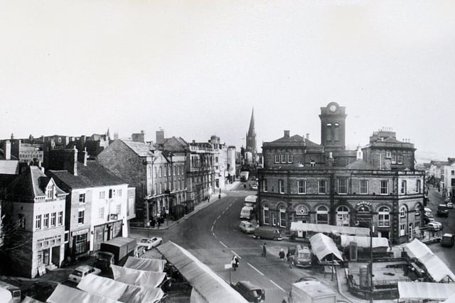 New Square, Chesterfield, in 1968. The photo shows the Market Hall, with the top of the clock tower looking rather different than it does today. Photo: Derbyshire Times