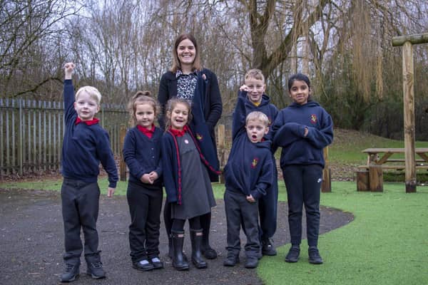 Headteacher Louise Tate with children at Poolsbrook Primary Academy.