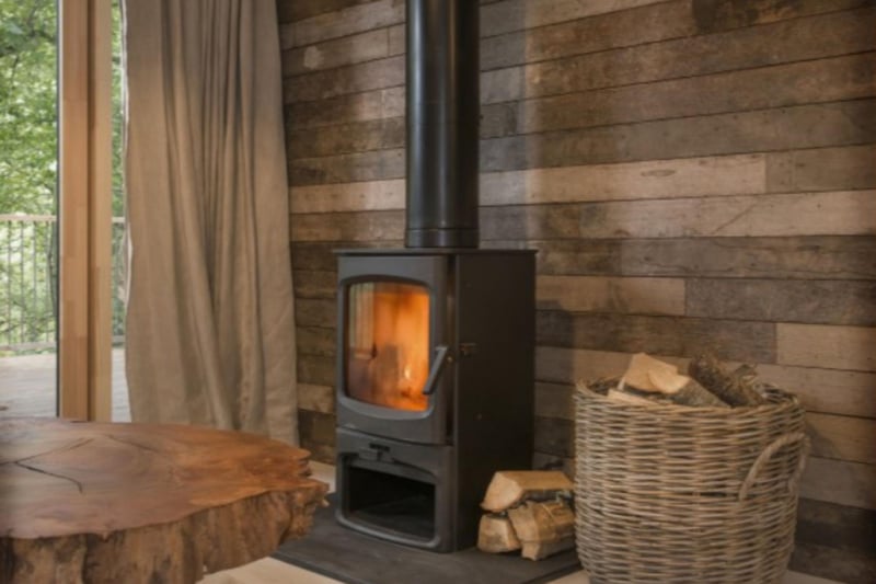 A wood burner keeps things cozy inside.