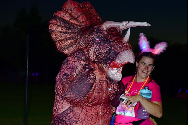 Participant dressed as a dinosaur raised laughs among fellow walkers.