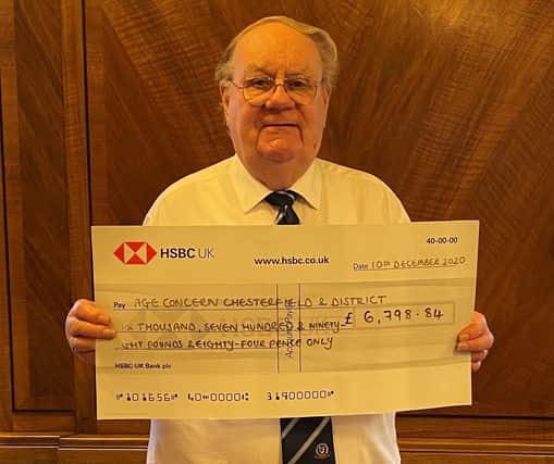 Councillor Gordon Simmons with £6,798 cheque for Age Concern.