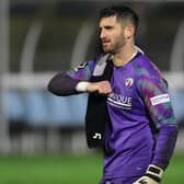 Chesterfield goalkeeper Shwan Jalal is back in training after going off injured at half-time against Chorley.
