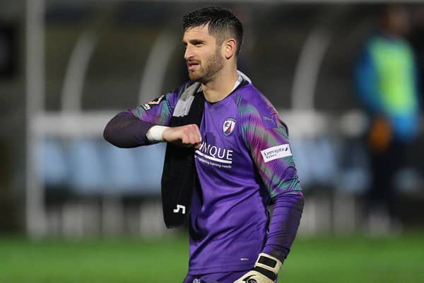Chesterfield goalkeeper Shwan Jalal is back in training after going off injured at half-time against Chorley.