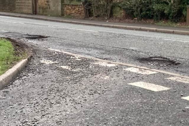 The deep holes on narrow roads are creating dangerous driving conditions. (Photo: Contributed)